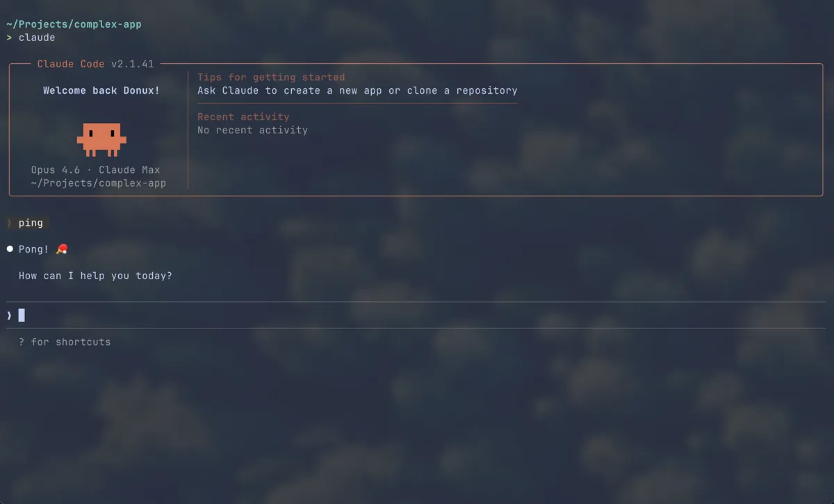 A modern terminal running Claude Code, with a natural language prompt and the AI responding