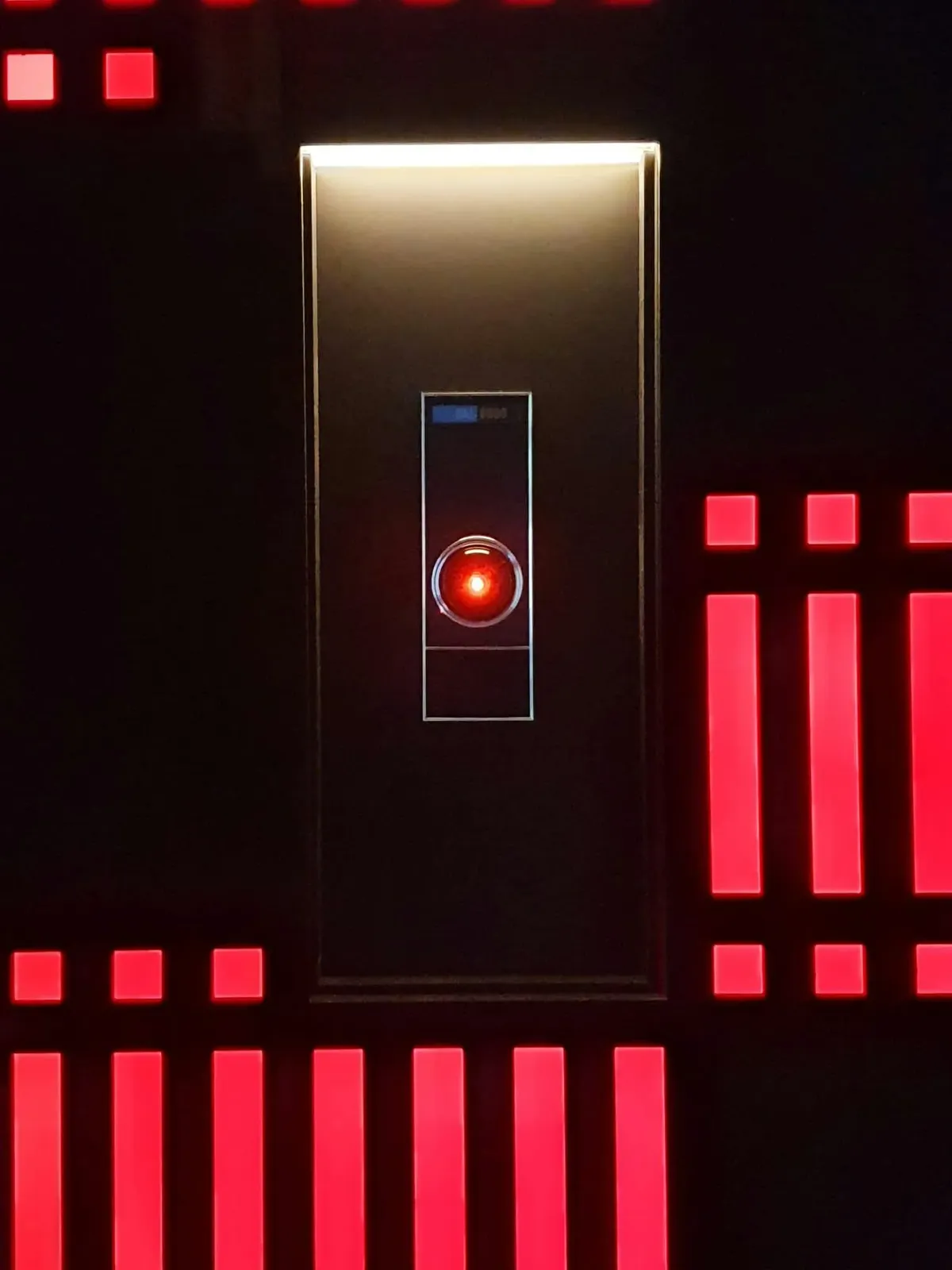 The glowing red fisheye lens of HAL 9000