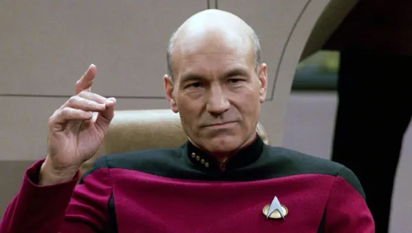 Captain Picard on the Enterprise bridge, speaking to the ship's computer